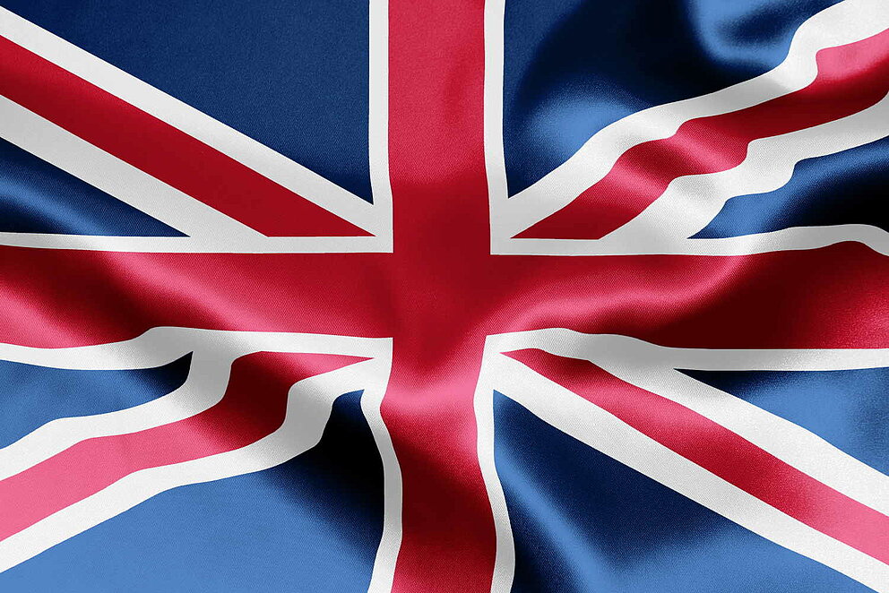 Nahaufnahme einer wehenden Flagge des Vereinigten Königreichs.