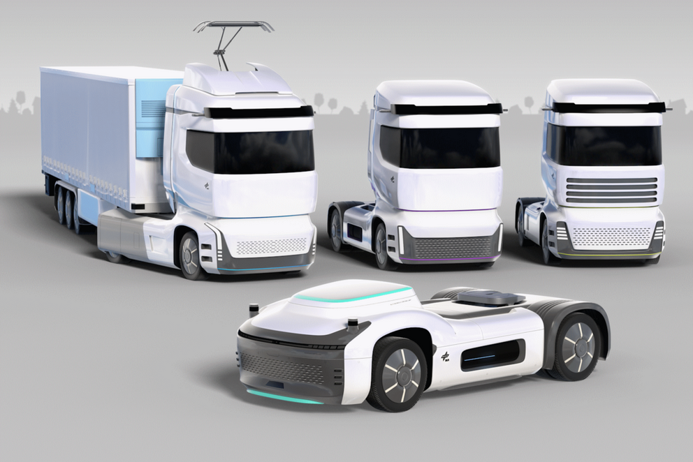 In einer 3D-Darstellung sind 3 LKW und ein futuristisches Fahrerhaus eines LKWs dargestellt.